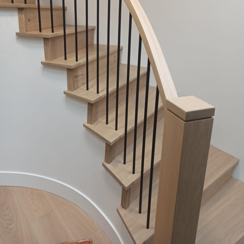 CUSTOM SOLID WOOD SPIRAL STAIR CASE.
VERY DIFFICULT JOB AS EACH TREAD WAS A CUSTOM SHAPE
INSTALLED BY DIVINE FLOORS