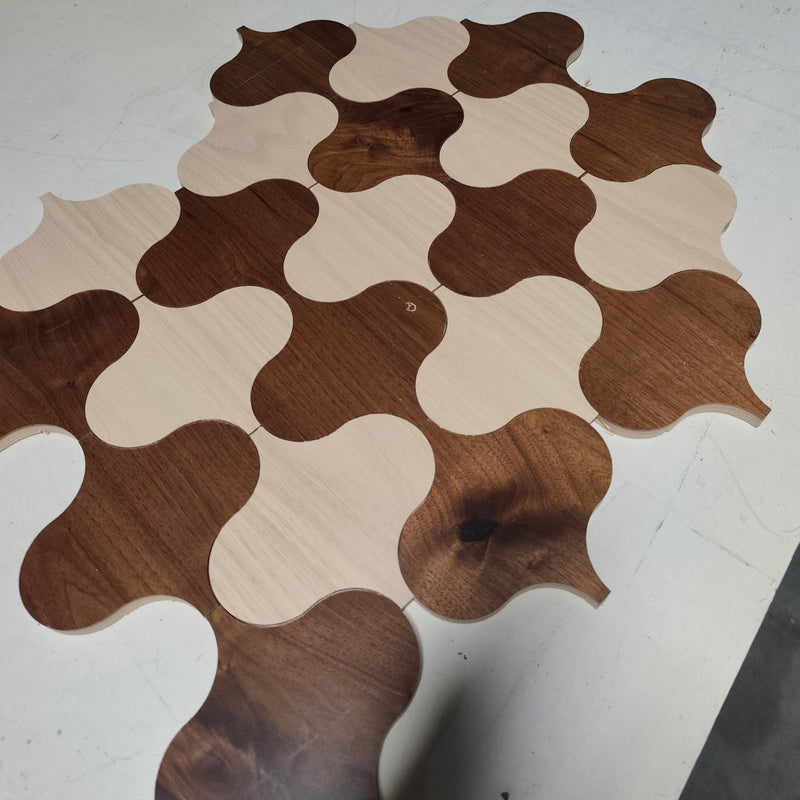 WE ARE TESTING OUR OUR CNC'S ABILITIES.

THESE ARE SCRAP PIECES OF FLOORING THAT WE CUT ON THE CNC TO BE USED ON A FEATURE WALL