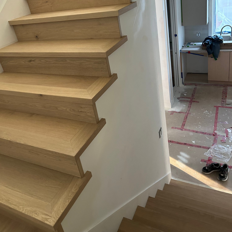 CUSTOM MANUFACTURED STAIR NOSING (10001)
INSTALLER DID MITRE CUT AND HORN FABRICATION
INSTALLED BY WOODPECKER FLOORING